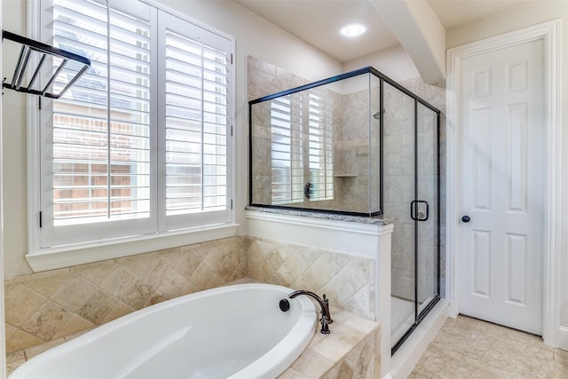 131 Lavaca Dr, Irving, TX 75039 - full bath with a garden tub, a shower stall, plenty of natural light, and tile patterned flooring