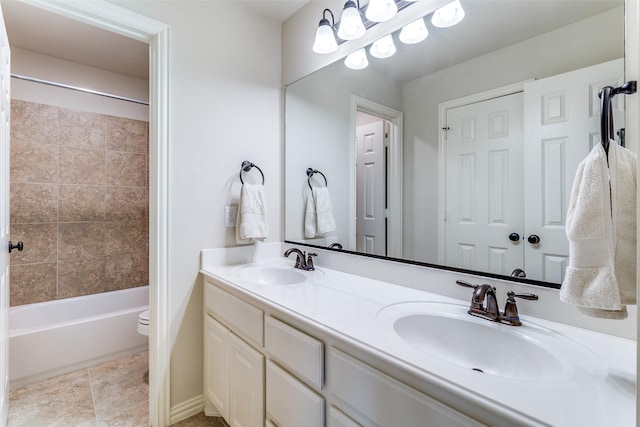 131 Lavaca Dr, Irving, TX 75039 - bathroom featuring double vanity, toilet, and shower / washtub combination