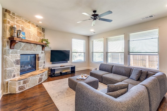 131 Lavaca Dr, Irving, TX 75039 - living room with a stone fireplace, a ceiling fan, wood finished floors, baseboards, and recessed lighting