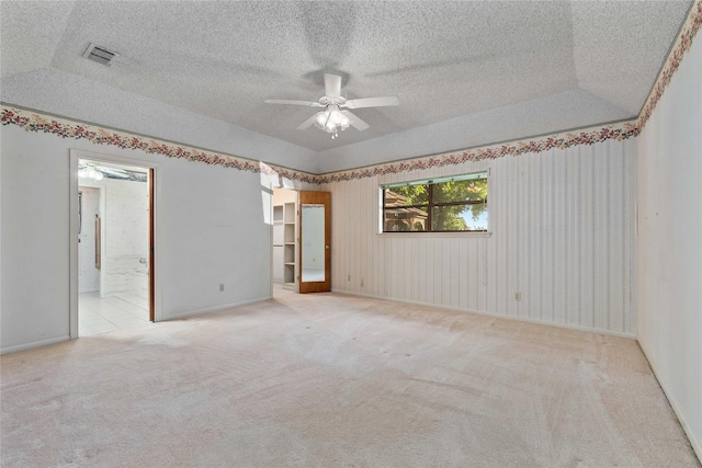 1025 S Lamar St, De Leon, TX 76444 - unfurnished room with ceiling fan, carpet, a textured ceiling, and baseboards