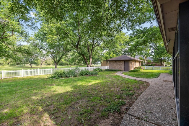 1025 S Lamar St, De Leon, TX 76444 - view of yard featuring an outbuilding