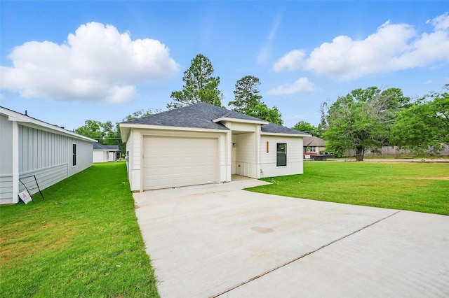 2738 W Washington St, Denison, TX 75020 - view of front of house with a front lawn, driveway, a shingled roof, and a garage