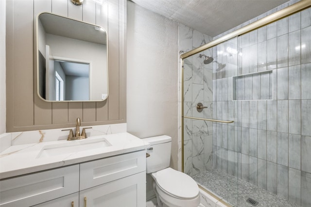 1336 Whittenburg Dr, Fort Worth, TX 76134 - bathroom featuring toilet, vanity, and a stall shower
