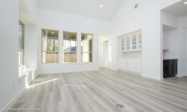 8409 Peach St, Justin, TX 76247 - unfurnished sunroom featuring lofted ceiling