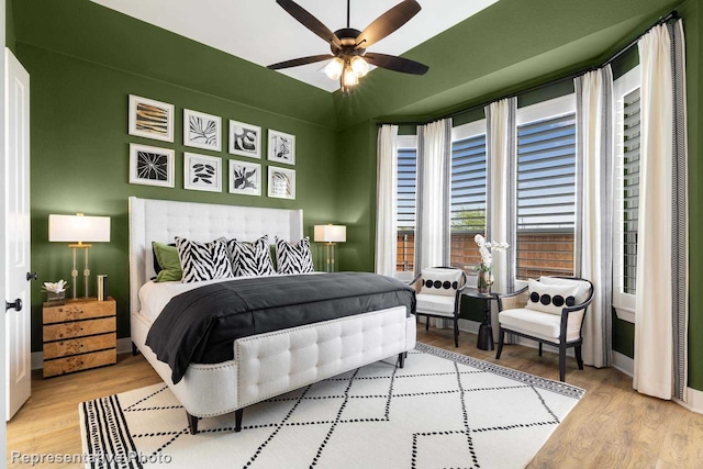 8409 Peach St, Justin, TX 76247 - bedroom featuring wood finished floors, ceiling fan, and baseboards