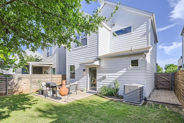 1115 Crownview Ln, Dallas, TX 75208 - rear view of house with central AC and a patio area