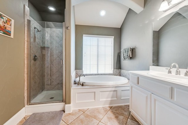 5946 Wallis Dr, Frisco, TX 75033 - full bathroom featuring a garden tub, a shower stall, vanity, and tile patterned floors