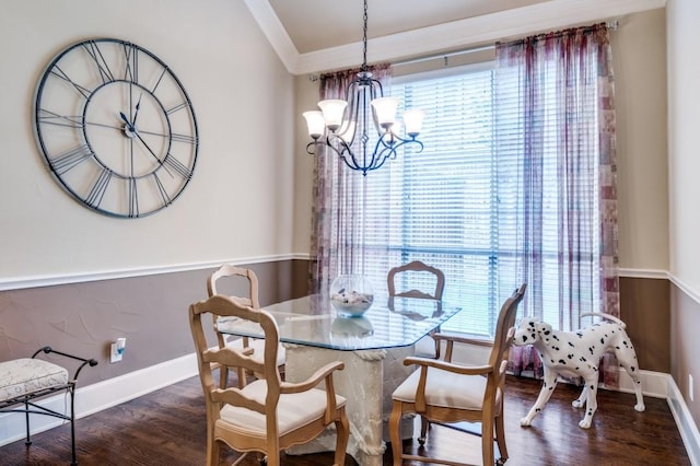 5946 Wallis Dr, Frisco, TX 75033 - dining area featuring crown molding, healthy amount of natural light, wood finished floors, baseboards, and a chandelier