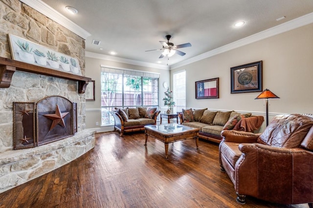5946 Wallis Dr, Frisco, TX 75033 - living room featuring wood finished floors, a ceiling fan, ornamental molding, a fireplace, and recessed lighting