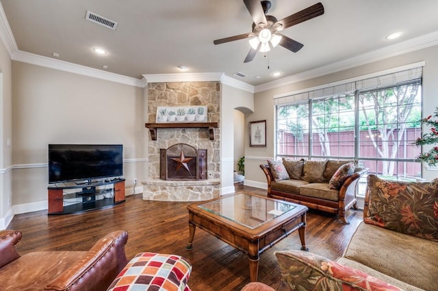 5946 Wallis Dr, Frisco, TX 75033 - living area with wood finished floors, crown molding, a ceiling fan, a fireplace, and recessed lighting