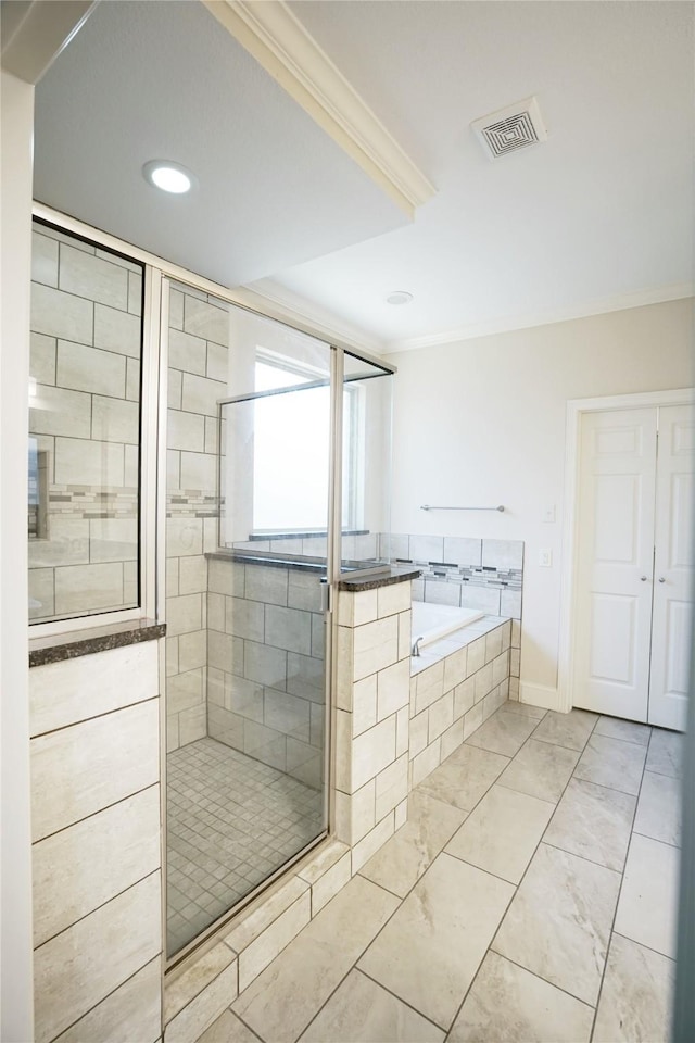 720 Madeline Ct, Azle, TX 76020 - full bath featuring a shower stall, a garden tub, recessed lighting, crown molding, and marble look tiles