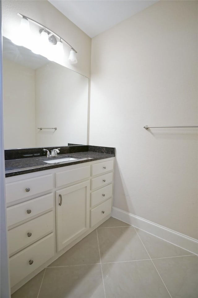 720 Madeline Ct, Azle, TX 76020 - bathroom with vanity, tile patterned floors, and baseboards