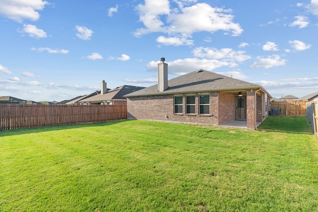 4130 Gaillardia Way, Forney, TX 75126 - rear view of property with brick siding, a chimney, roof with shingles, and a patio