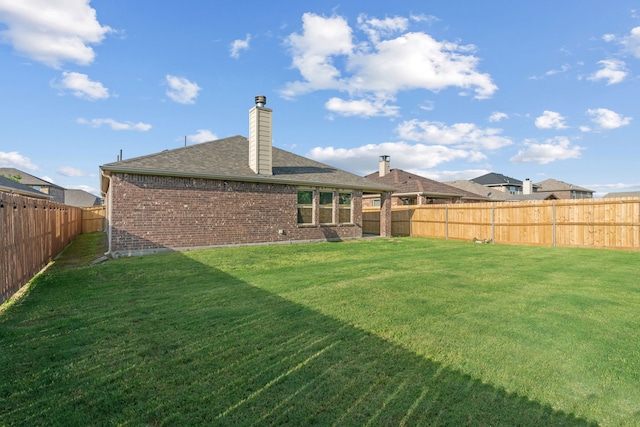 4130 Gaillardia Way, Forney, TX 75126 - rear view of property with brick siding, a chimney, and roof with shingles