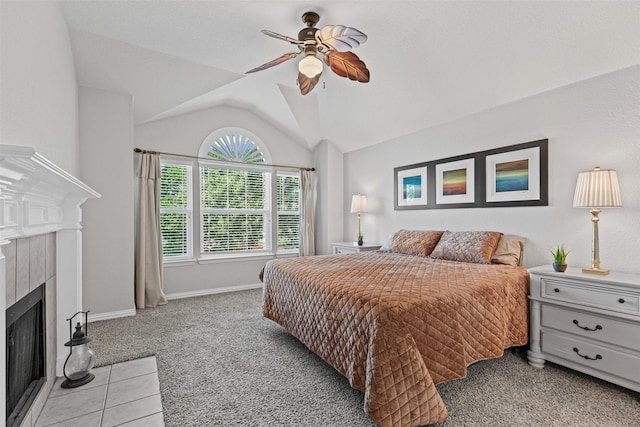 5655 Redgum Dr, Fort Worth, TX 76244 - bedroom featuring light carpet, vaulted ceiling, a fireplace, baseboards, and a ceiling fan