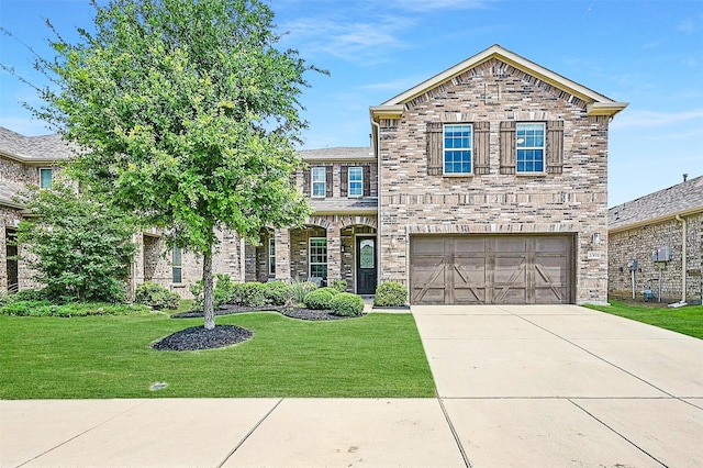 3501 Alamosa River Dr, Prosper, TX 75078 - view of front facade with a front lawn, an attached garage, and driveway