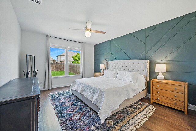 3501 Alamosa River Dr, Prosper, TX 75078 - bedroom with wood finished floors, baseboards, and a ceiling fan