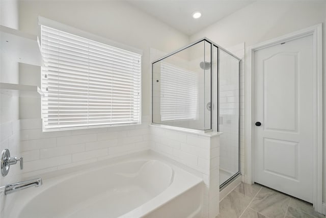 3501 Alamosa River Dr, Prosper, TX 75078 - bathroom with a bath, a stall shower, marble look tiles, and plenty of natural light