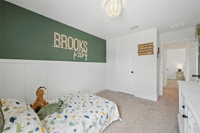 3501 Alamosa River Dr, Prosper, TX 75078 - bedroom featuring light colored carpet and wainscoting