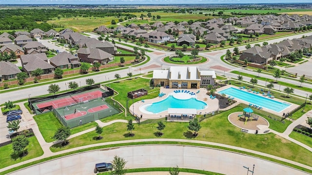3501 Alamosa River Dr, Prosper, TX 75078 - aerial perspective of suburban area featuring a pool