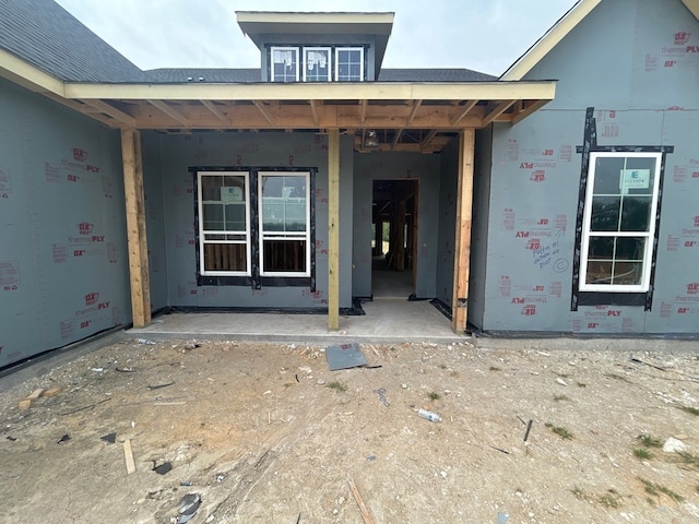 14 Louis Rd, Sherman, TX 75090 - property entrance featuring roof with shingles