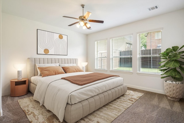 546 El Camino Dr, Frisco, TX 75036 - bedroom with light colored carpet, baseboards, and ceiling fan