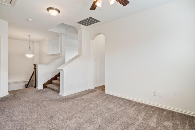 546 El Camino Dr, Frisco, TX 75036 - empty room with carpet, a ceiling fan, baseboards, arched walkways, and a smoke detector