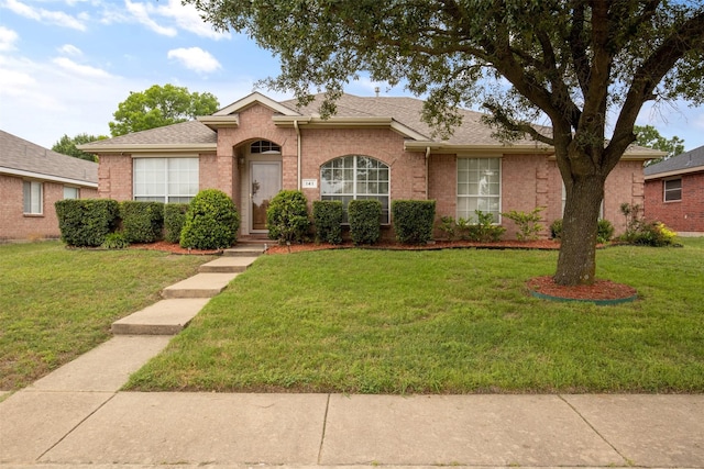 141 Buffalo Creek Dr, Desoto, TX 75115 - view of front of home featuring a front yard and brick siding