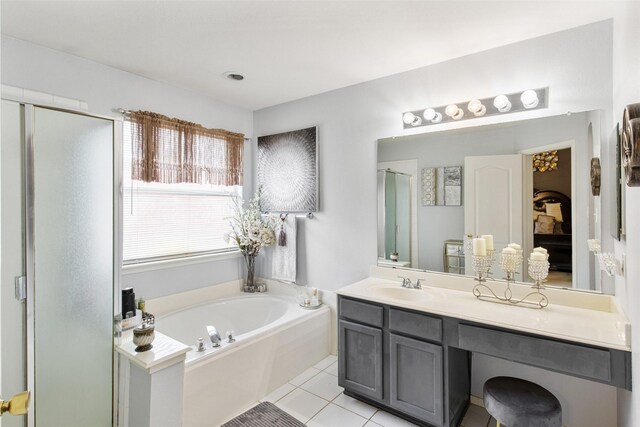141 Buffalo Creek Dr, Desoto, TX 75115 - ensuite bathroom featuring a bath, vanity, a stall shower, and tile patterned flooring