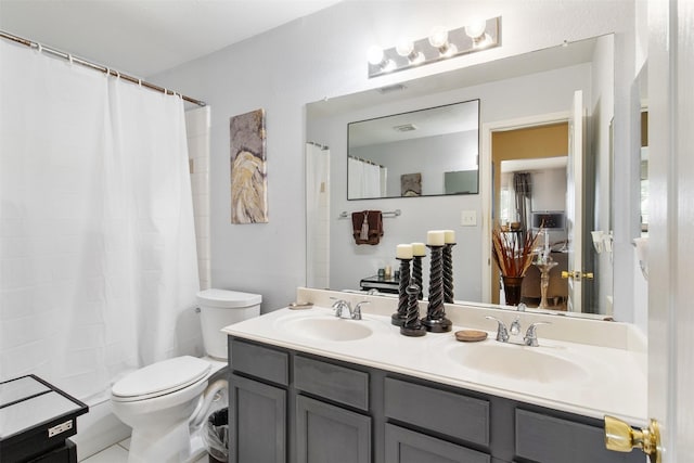 141 Buffalo Creek Dr, Desoto, TX 75115 - bathroom with double vanity, toilet, and curtained shower