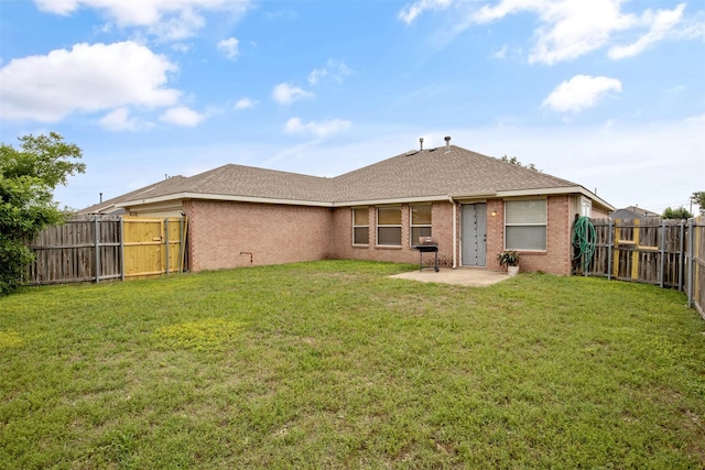 141 Buffalo Creek Dr, Desoto, TX 75115 - rear view of property featuring brick siding, a patio, and roof with shingles