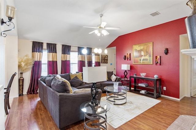 141 Buffalo Creek Dr, Desoto, TX 75115 - living room featuring a ceiling fan, lofted ceiling, wood finished floors, and baseboards
