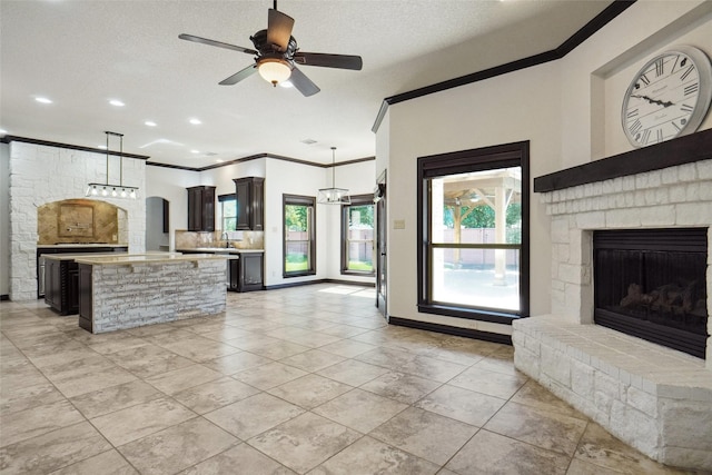 950 Roxbury Way, Keller, TX 76248 - unfurnished living room with ornamental molding, a fireplace, light tile patterned floors, a ceiling fan, and recessed lighting