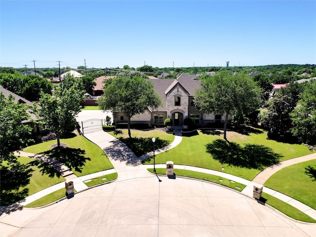 950 Roxbury Way, Keller, TX 76248 - view of front facade featuring curved driveway, a front yard, and stone siding