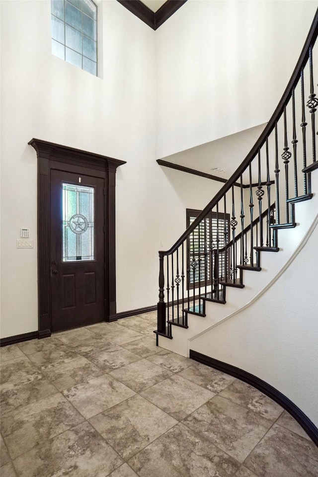 950 Roxbury Way, Keller, TX 76248 - entryway with baseboards, a high ceiling, stairs, and ornamental molding