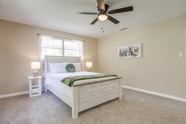 1309 Manor Dr, Cleburne, TX 76033 - bedroom with light carpet, baseboards, and ceiling fan