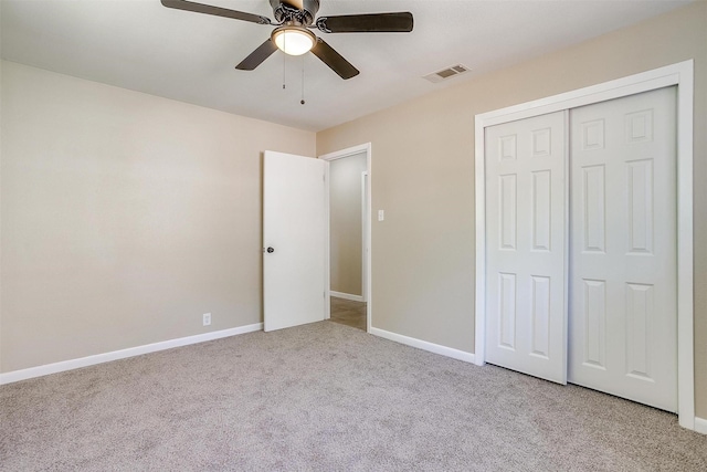 1309 Manor Dr, Cleburne, TX 76033 - unfurnished bedroom featuring light carpet, baseboards, a closet, and a ceiling fan