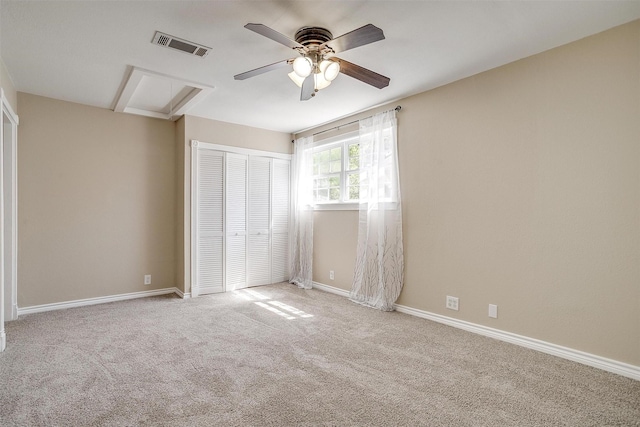 1309 Manor Dr, Cleburne, TX 76033 - unfurnished bedroom featuring a closet, carpet, baseboards, and ceiling fan