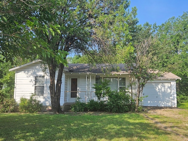 5569 Korth St, Sansom Park, TX 76114 - view of front of house featuring a front lawn and dirt driveway