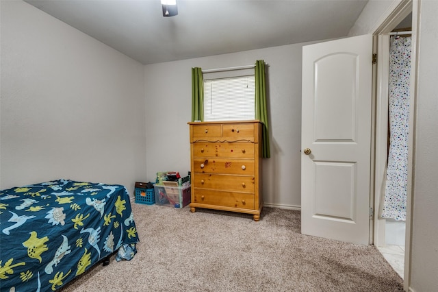 1409 Roman Rd, Grand Prairie, TX 75050 - carpeted bedroom with a ceiling fan