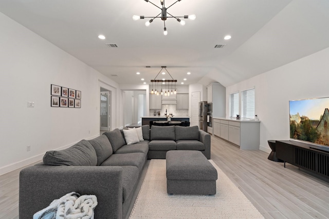 2316 Lazy Dog Ln, Northlake, TX 76247 - living room featuring a chandelier, light wood-style floors, baseboards, and recessed lighting