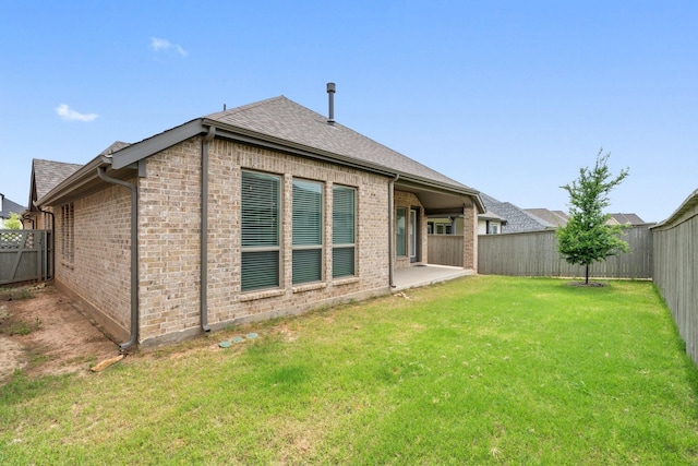 2316 Lazy Dog Ln, Northlake, TX 76247 - rear view of house featuring roof with shingles and brick siding