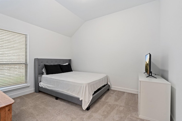 2316 Lazy Dog Ln, Northlake, TX 76247 - bedroom with vaulted ceiling, multiple windows, light colored carpet, and baseboards