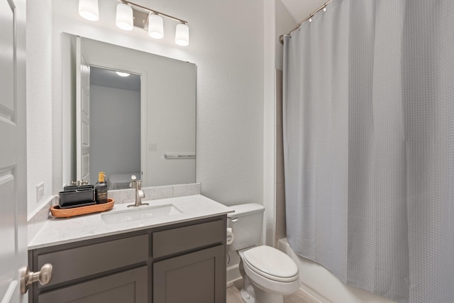 2316 Lazy Dog Ln, Northlake, TX 76247 - bathroom with vanity, shower / bathtub combination with curtain, and toilet