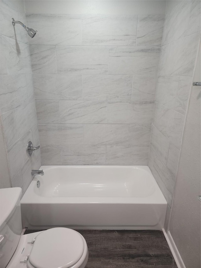 5209 Wharton Dr, Fort Worth, TX 76133 - full bathroom with toilet, shower / bath combination, and wood finished floors