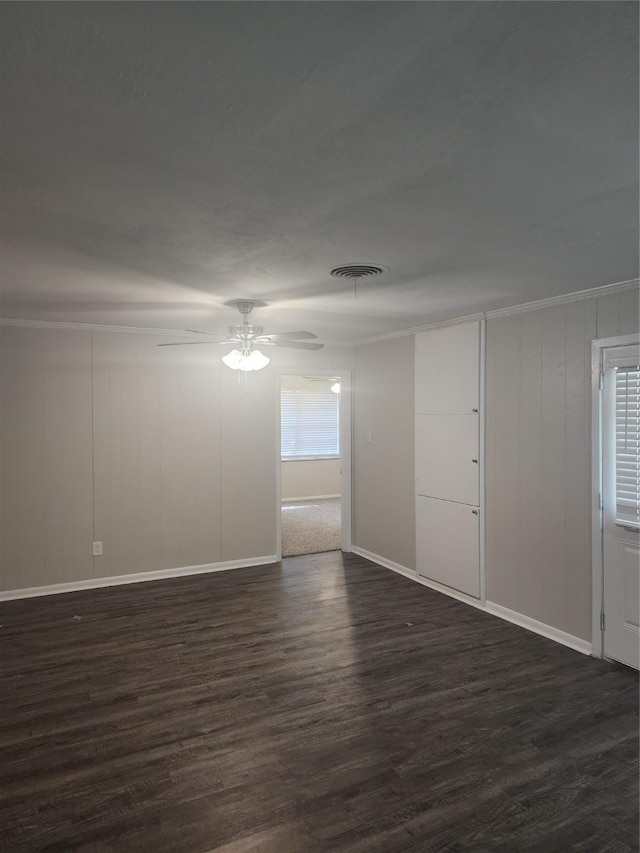 5209 Wharton Dr, Fort Worth, TX 76133 - empty room featuring dark wood-type flooring, baseboards, and a ceiling fan