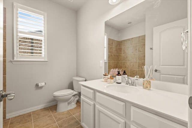 818 Birdie Dr, Allen, TX 75013 - full bath with vanity, toilet, baseboards, tile patterned flooring, and a shower