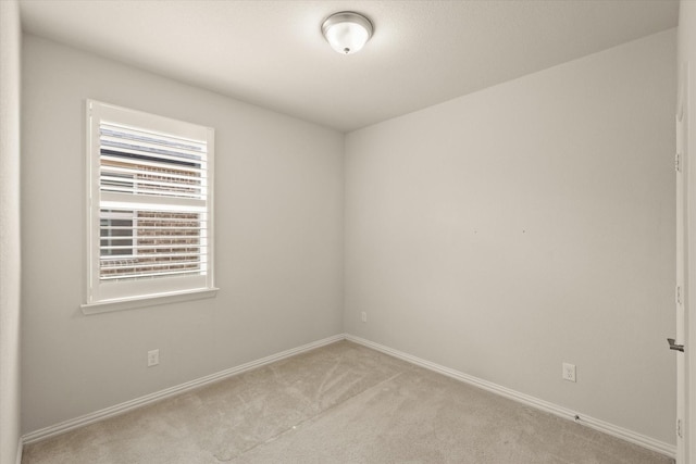818 Birdie Dr, Allen, TX 75013 - empty room featuring light colored carpet and baseboards