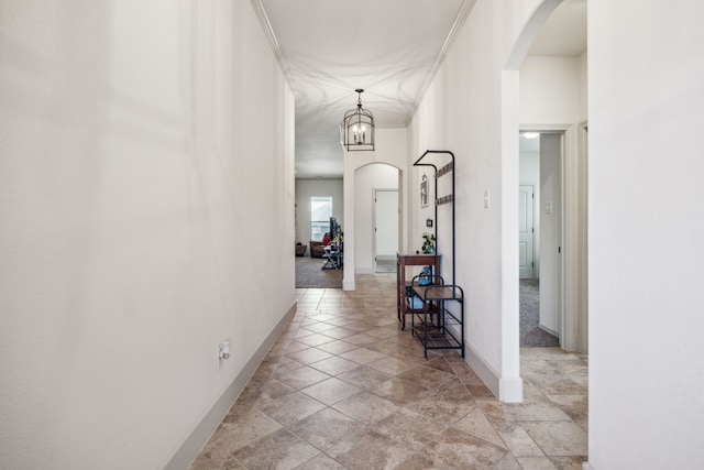 1685 Laramie Ln, Burleson, TX 76028 - hallway with arched walkways and baseboards