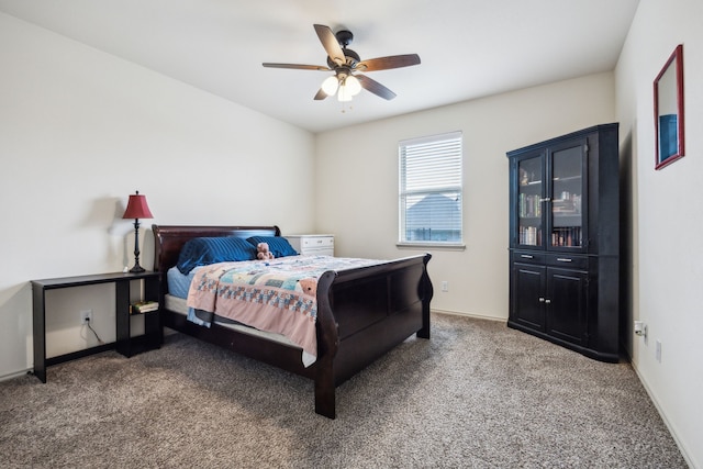 1685 Laramie Ln, Burleson, TX 76028 - carpeted bedroom with a ceiling fan and baseboards